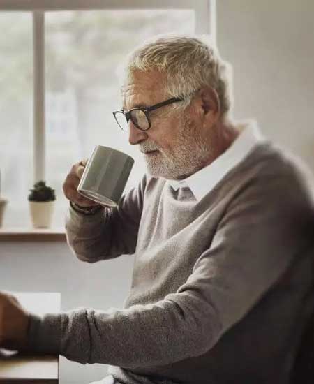 Man Drinking a Cup of Tea
